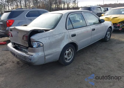 1999 Toyota Corolla Ve из США, поврежденный, VIN 2T1BR12E1XC128924